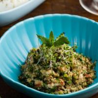 Tabbouleh · Parsley, mint, bulgur, lemon confit, tomatoes, pomegranates, molasses, and olive oil.