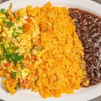 Huevos A La Mexicana Breakfast · Scrambled eggs with onion, tomato and jalapeno. Served with rice and beans.