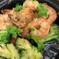 Goong Gratiem · Shrimp, garlic and cilantro in white pepper sauce over   steamed bok choy served with Jasmin...