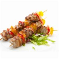 Chicken Seekh Kebab · Cubes of Chicken Marinated in Mild Herb, Sour Cream and Cashew Nuts in Charcoal Oven.