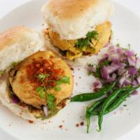 Vada Pao  · Fried seasoned potato balls served in a bun with tangy sweet and spicy chutney.