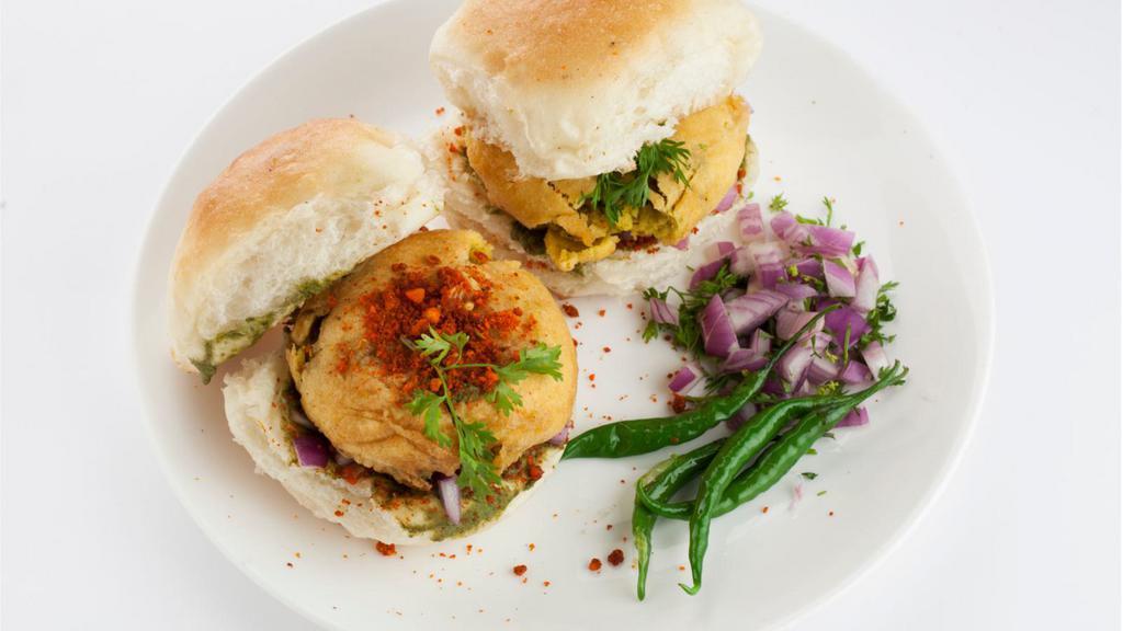 Vada Pao  · Fried seasoned potato balls served in a bun with tangy sweet and spicy chutney.