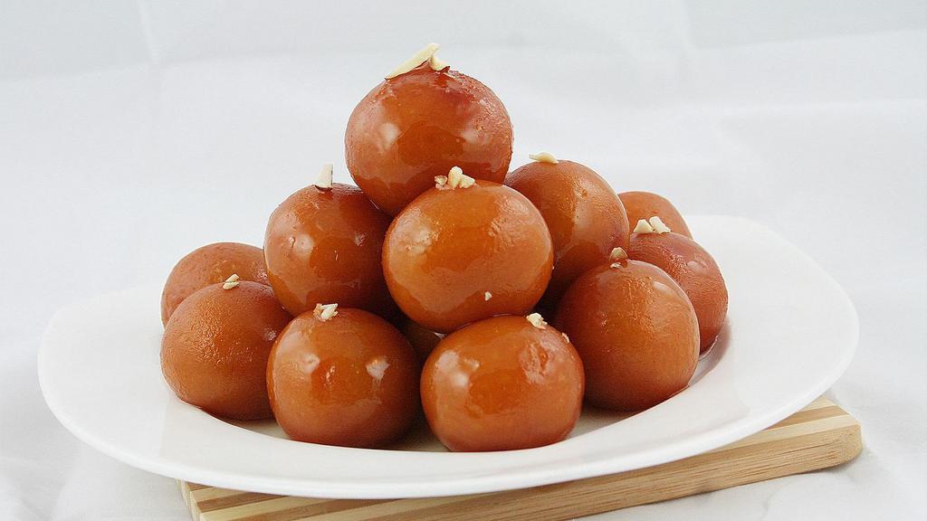 Gulab Jamun  · A light pastry dumpling made from dry milk and honey.