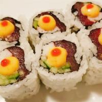 Boston Roll · Rolled with tuna, crab, cucumber and spicy sauce on top. 

Consuming raw fish may increase t...