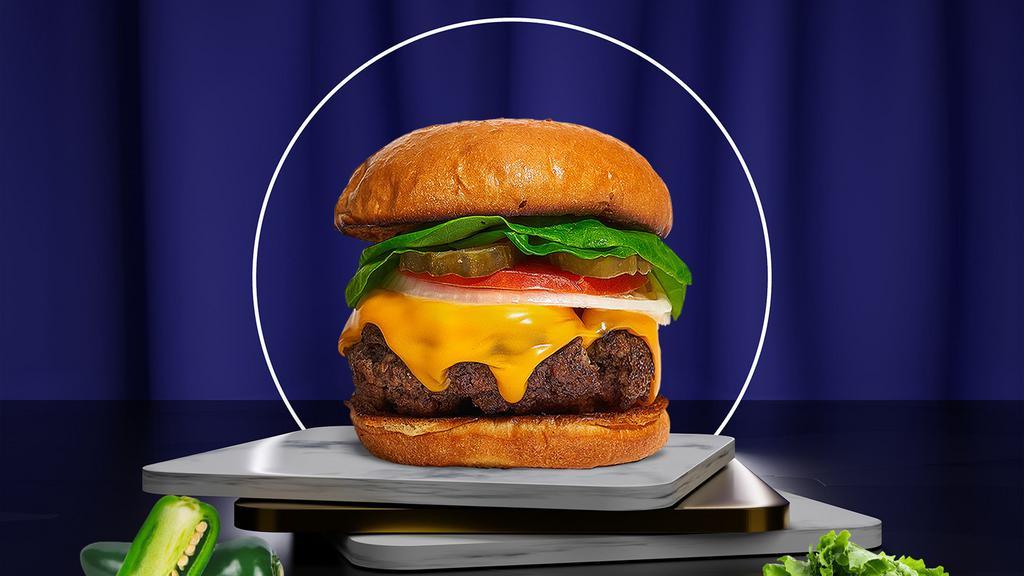 Cheese Chaser Burger · Your choice of grilled or fried patty topped with melted cheese, lettuce, tomato, onion, and pickles. Served on a warm bun.