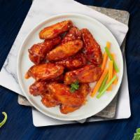 6-Piece Hot Wings · Fresh chicken wings breaded, fried until golden brown, and tossed in hot sauce.