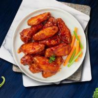 15-Piece Hot Wings · Fresh chicken wings breaded, fried until golden brown, and tossed in hot sauce.