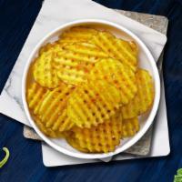 Waffle Fries · Idaho potatos sliced in an alternating waffle pattern, fried until golden brown, and garnish...