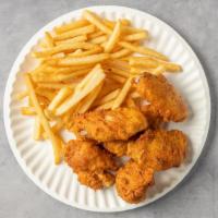 4 Chicken Wings · With french fries and can of soda.