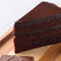 Chocolate Cake · Rich, moist layers of chocolate cake with fluffy chocolate frosting.