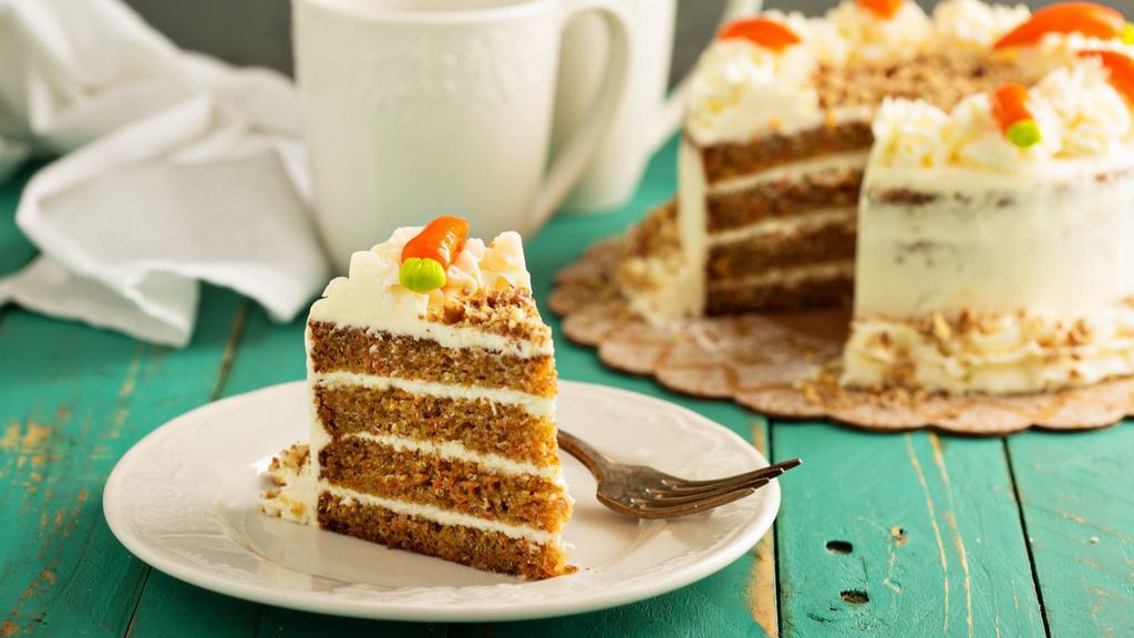 Carrot Cake · Perfectly spiced, moist carrot cake with a traditional, rich and tangy cream cheese frosting.