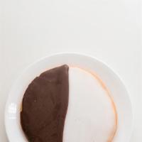 Black & White Cookie · Soft, vanilla sugar cookies dipped in a sweet vanilla glaze on one side and rich chocolate g...