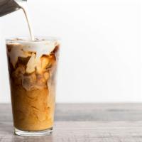 Iced Coffee · Freshly brewed coffee over ice. Add creamer if you'd like. Sweeteners on request.