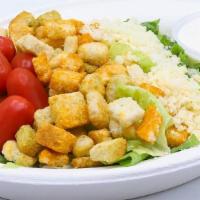 Dairy Ceasar Salad · Lettuce, grape tomatoes, homemade croutons, parmesan cheese, and creamy caesar dressing.