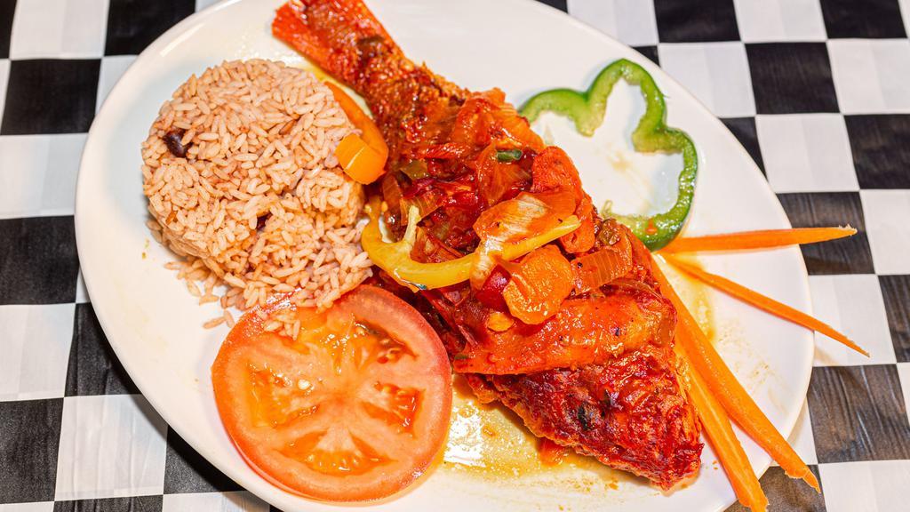 Snapper Dinner · Served your choice of White Rice or Rice and Peas, Plantain, and Vegetables