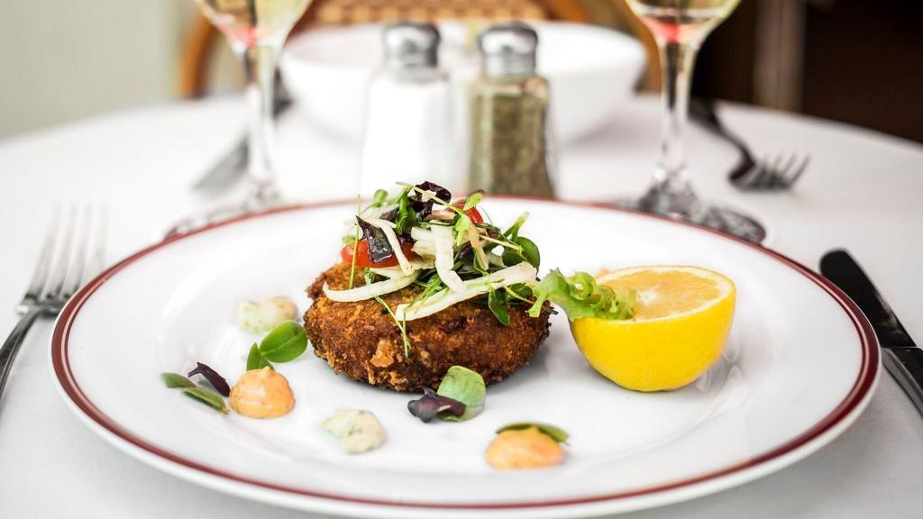 Maryland Crab Cake · One of our best appetizers; Made with the best crab meat and served with a side of horseradish aioli, radish, fennel salad and fresh lemon.