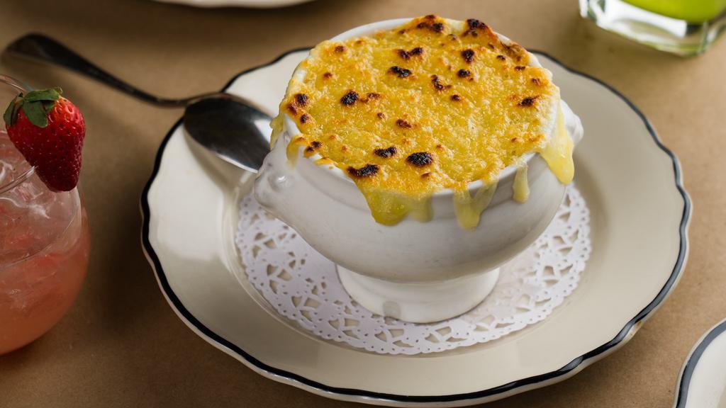 French Onion Soup (Cup) · Prepared Daily. French onion soup topped with brioche bread and melted gruyere. No cream. No butter.