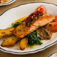 Fillet Of Atlantic Salmon · Super Healthy; Seared on the skin, served with a purée of eggplant, fingerling potatoes, roa...
