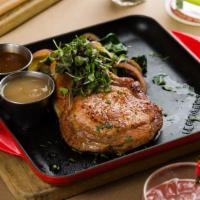 Natural Durok Pork Chop · Simply pan seared with Breton butter, rosemary and thyme. Served with apple chutney