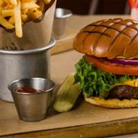 Classic 9 Oz. Black Angus Burger · Includes a side of your choice; on our grilled brioche bun with lettuce, beefsteak tomato, r...