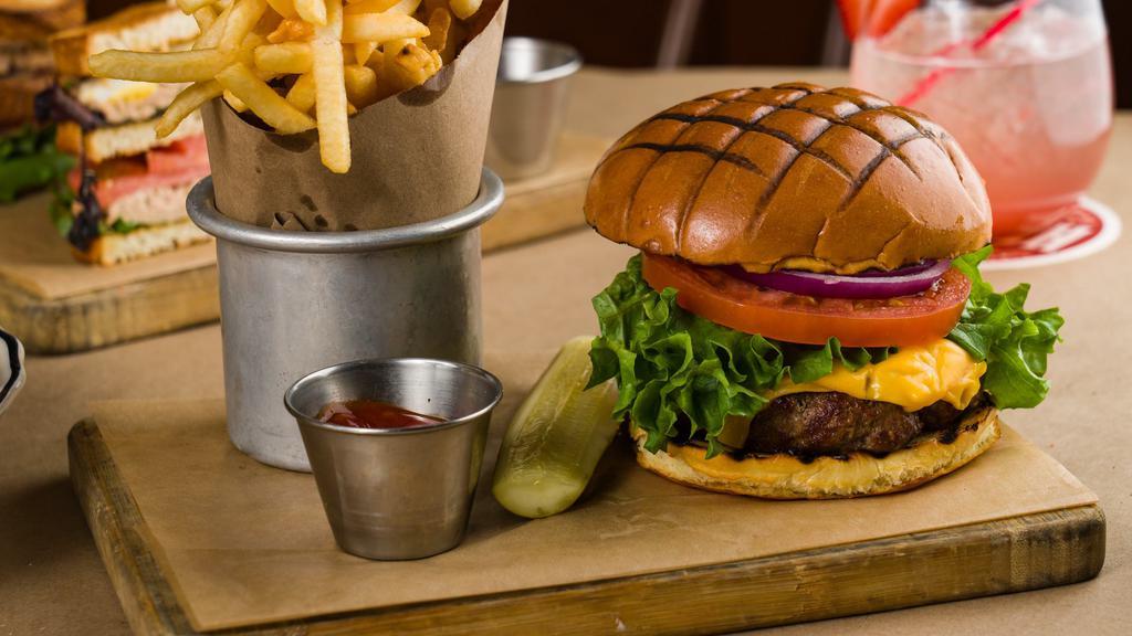 Classic 9 Oz. Black Angus Burger · Includes a side of your choice; on our grilled brioche bun with lettuce, beefsteak tomato, red onions and pickle.