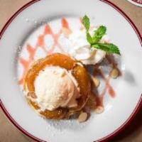 Apple Tart Tatin · Upside down apple tart topped with vanilla ice cream.