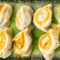 Veggie Gyoza (Vg) · Pan-fried veggie dumplings, house dipping sauce