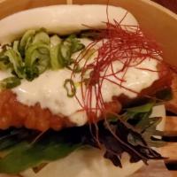 Karaage Bao  · Japanese fried chicken, fluffy steamed bun, homemade Namba sauce, spring mix, scallions, who...