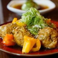 Tori Kamo Tsukune · Duck and chicken meatballs, house teriyaki sauce, scallion, yellow + red peppers, lightly po...
