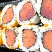 Spicy Tuna Roll · Fresh akami tuna with house sriracha mayo, red masago, sesame