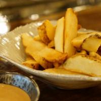 Steak Fries (Gf, Vg) · Crispy steak fries and house BBQ sauce