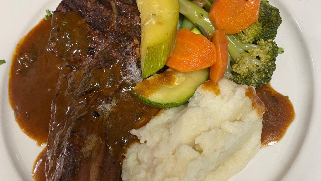 Veal Chops · Grilled with fresh rosemary served with mashed potatoes
