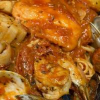 Zuppa Di Pesci · Shrimp, scallops, mussels, clams and fish in a light marinara sauce.
