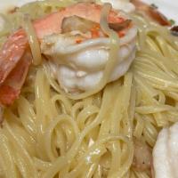 Shrimp Scampi · Fresh garlic, white wine, and lemon sauce.