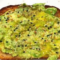 Avocado Toast · Two slices of organic bread, one whole avocado, drizzle of olive oil, and everything bagel s...