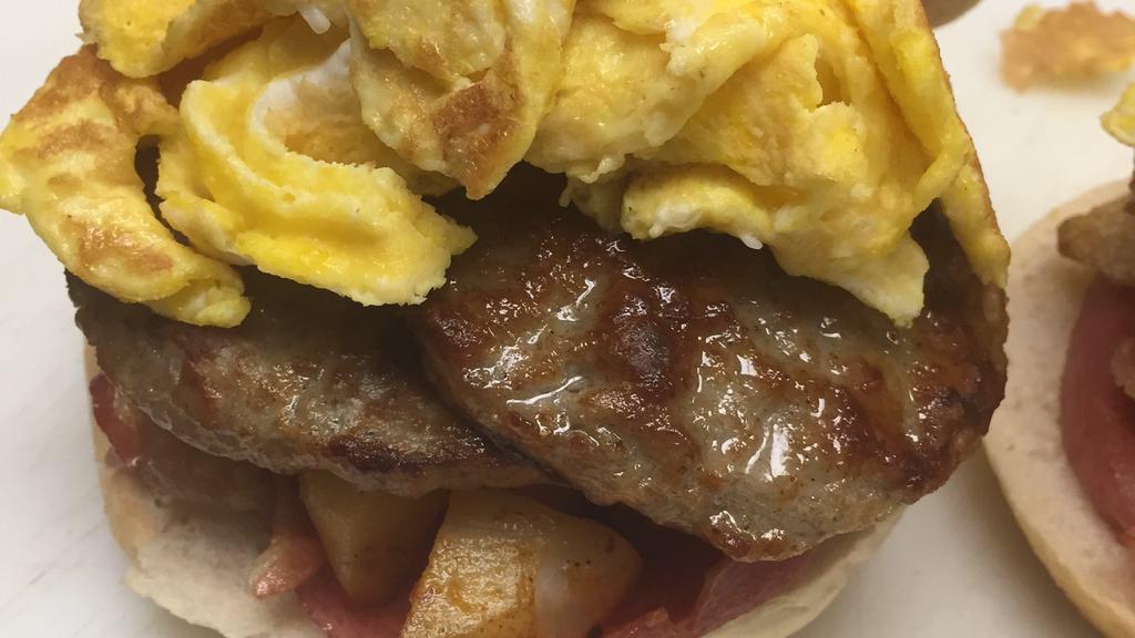 Belly Buster · Egg, bacon, sausage, pork roll, and mortły potato on a hard rol