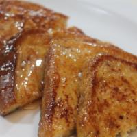 French Toast · Served with butter and maple syrup.