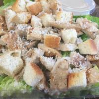 Chicken Caesar Salad · Romaine lettuce with grilled chicken, parmesan cheese, croutons, and Caesar dressing.