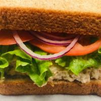 Tuna Salad & Swiss · With tomato, lettuce and Swiss served on whole wheat bread.