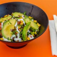 Street Bowl · Mexican rice, black beans, lettuce, corn, pico de gallo, cilantro, sour cream, fresh avocado.