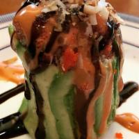 Avocado Bowl · Spicy. Spicy tuna and spicy salmon inside, wrapped with avocado and topped with tobiko, scal...