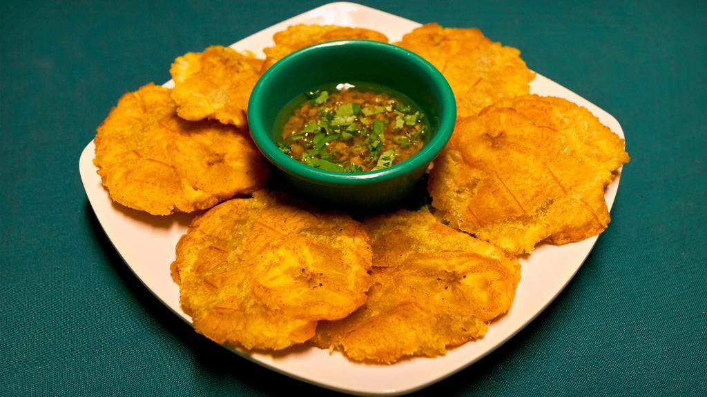 Tostones · Served with a mojito salsa.