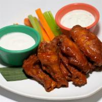 Wings Buffalo Style · Served with blue cheese, ranch, celery, and carrots.