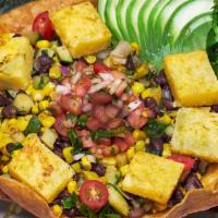 Taco Vegan Salad · Jalapeño grits polenta, yellow squash, zucchini, black beans, fresh corn, cherry tomatoes, o...