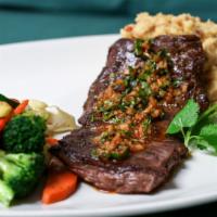 Skirt Steak Perfecto · Nine ounces grilled skirt steak (beautifully marinated overnight) topped with a chimichurri-...