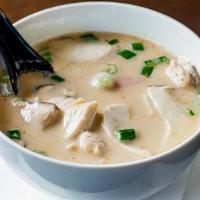 Tom Kha · Simmered aromatic herb with coconut milk for milder and slightly creamy with mushroom, scall...