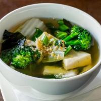 Veggie · House clear broth soup with mixed vegetables and tofu.