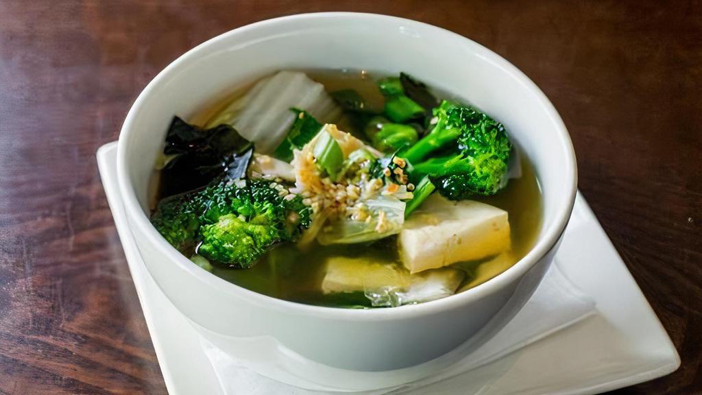 Veggie · House clear broth soup with mixed vegetables and tofu.