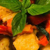 * Red Curry · Spicy. Red chili paste with coconut milk, bell peppers, basil, eggplant, and bamboo shoots

...