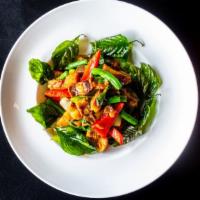 H-11. Pad Ga Prow Moo Grob · Crispy pork belly with string bean, bell pepper, onion, basil leaves, and basil sauce served...